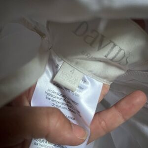 I wore this once it’s small I was 4 months pregnant and 100 pounds and 4’11